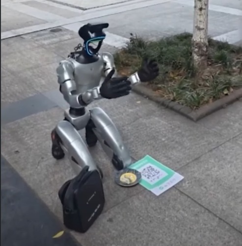 Robot Ngemis di China: Bersimpuh Minta Sedekah Sampai Ada QR Code Untuk Transfer Uang Robot Ngemis di China: Bersimpuh Minta Sedekah Sampai Ada QR Code Untuk Transfer Uang