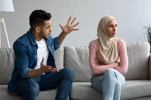 Apakah Wajib Menaati Suami Yang Gajinya Dibawah UMR? depositphotos 450572916 stock photo angry muslim man and woman